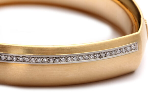 Armreif in Gold und Platin mit Diamanten